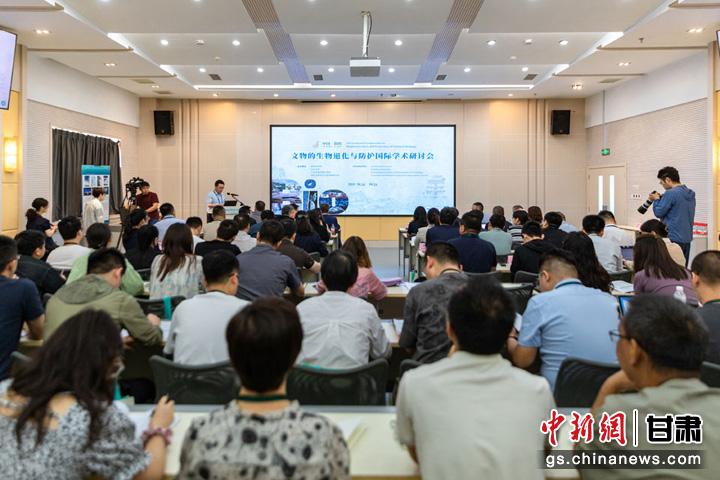 6月21日，文物的生物退化与防护国际学术研讨会在敦煌开幕。敦煌研究院供图